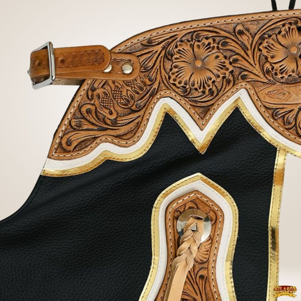Decorative horse saddle blanket with intricate patterns and fringes on a light background