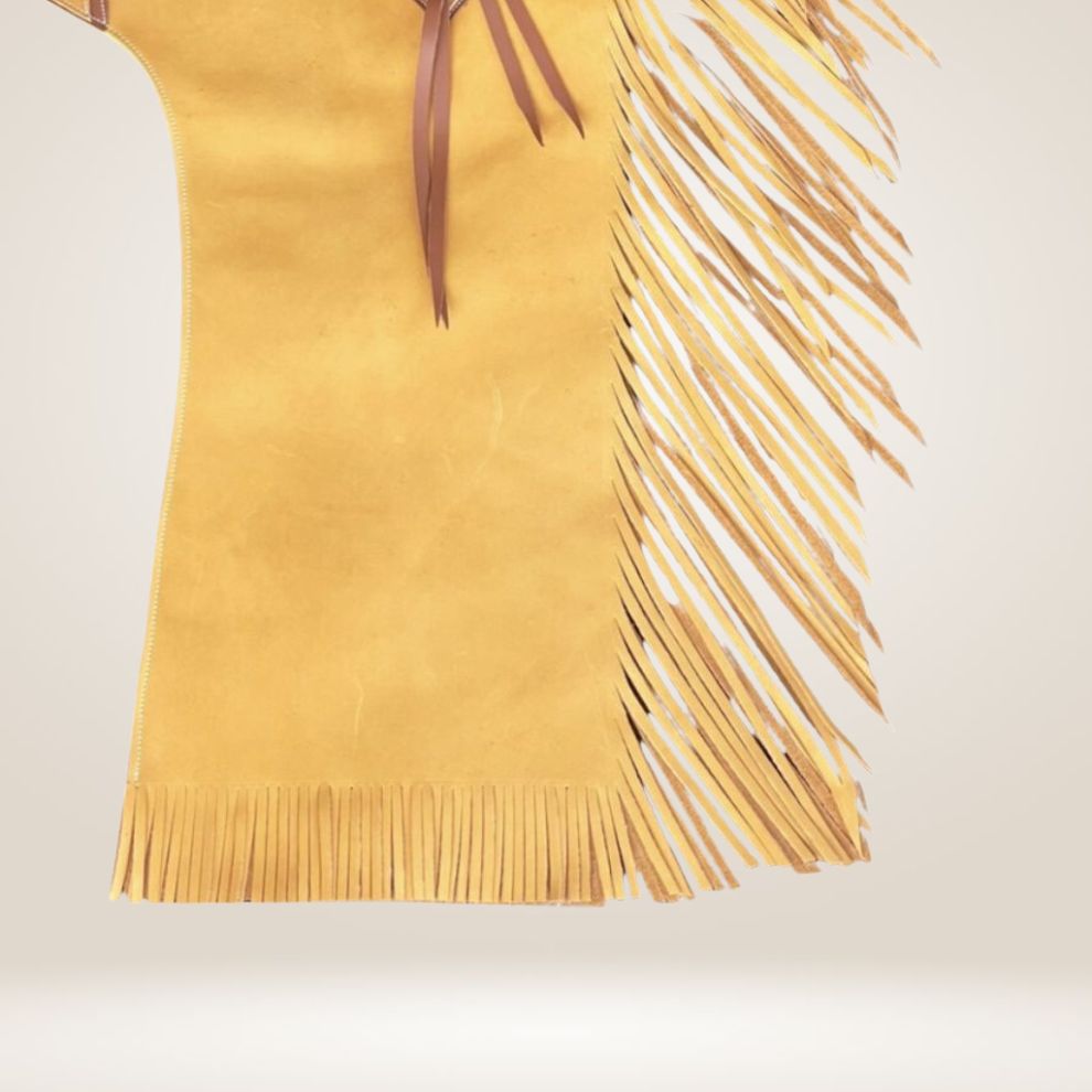 Yellow suede dress with fringe details on a light background