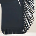 Black sleeveless top with fringe details on a light background