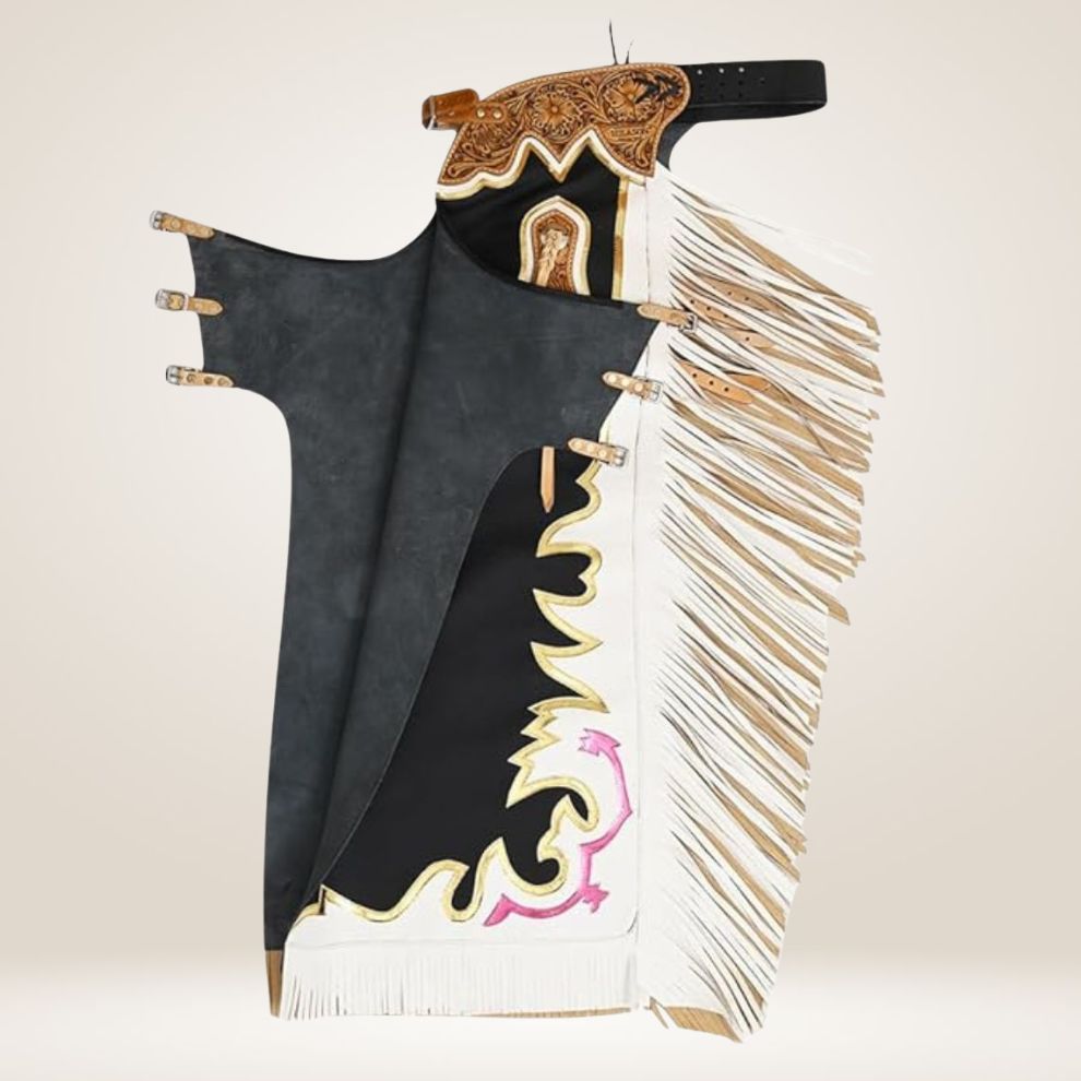 Black chaps with gold and white fringe and embroidery on a beige background