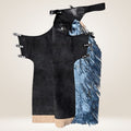 Black leather apron with blue accents on a beige background
