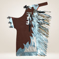 Brown apron with silver fringe and decorative elements on a beige background