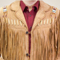 Beige fringed jacket with decorative elements on a plain background