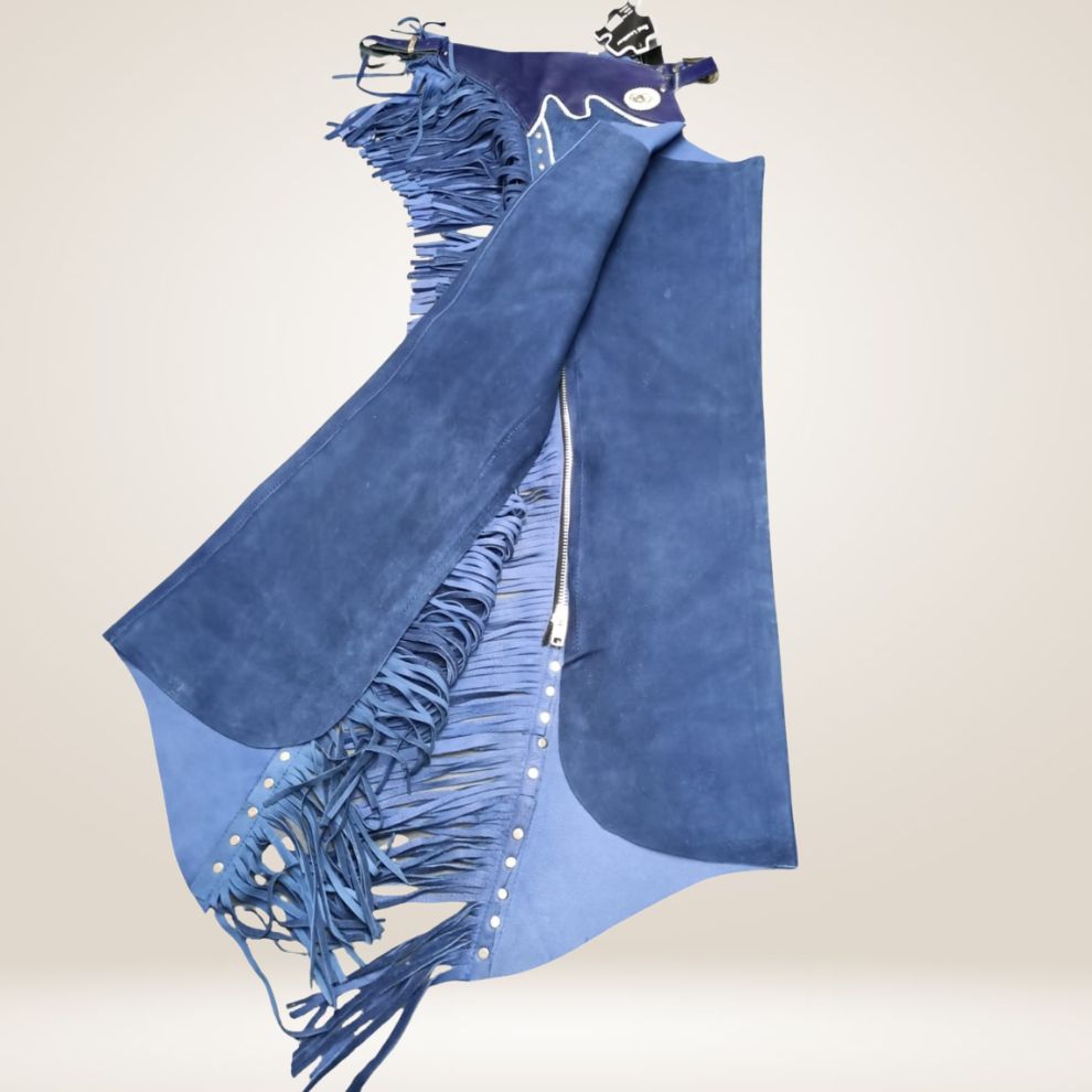 Blue suede jacket with fringe details on a beige background