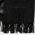 Black fringed jacket with a button on a neutral background