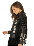 Woman wearing a black leather jacket with fringe details on a white background