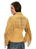Woman wearing a tan fringed jacket with decorative elements on a white background