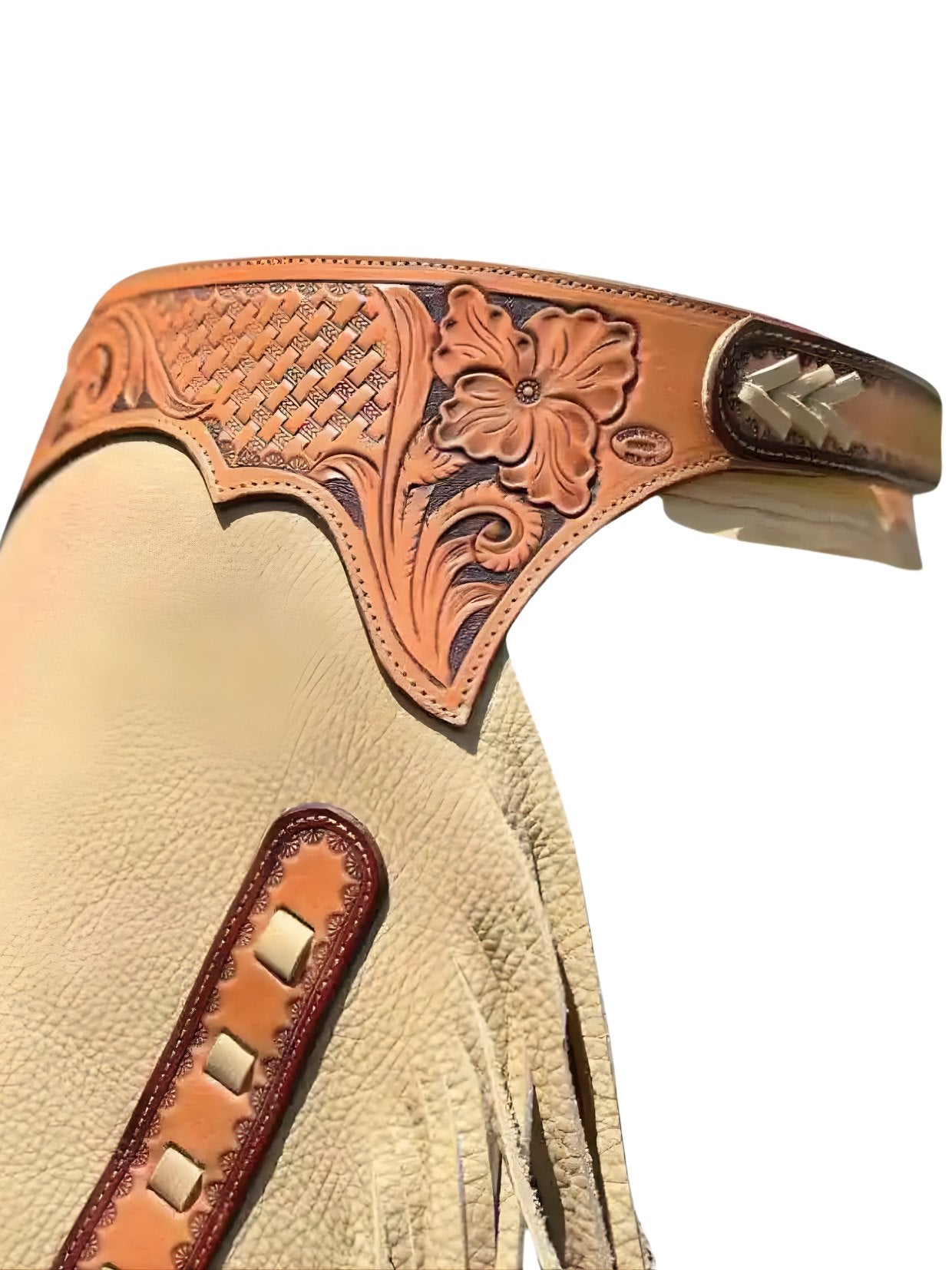 Close-up of a tan leather glove with intricate brown tooled design and tassels on a white background