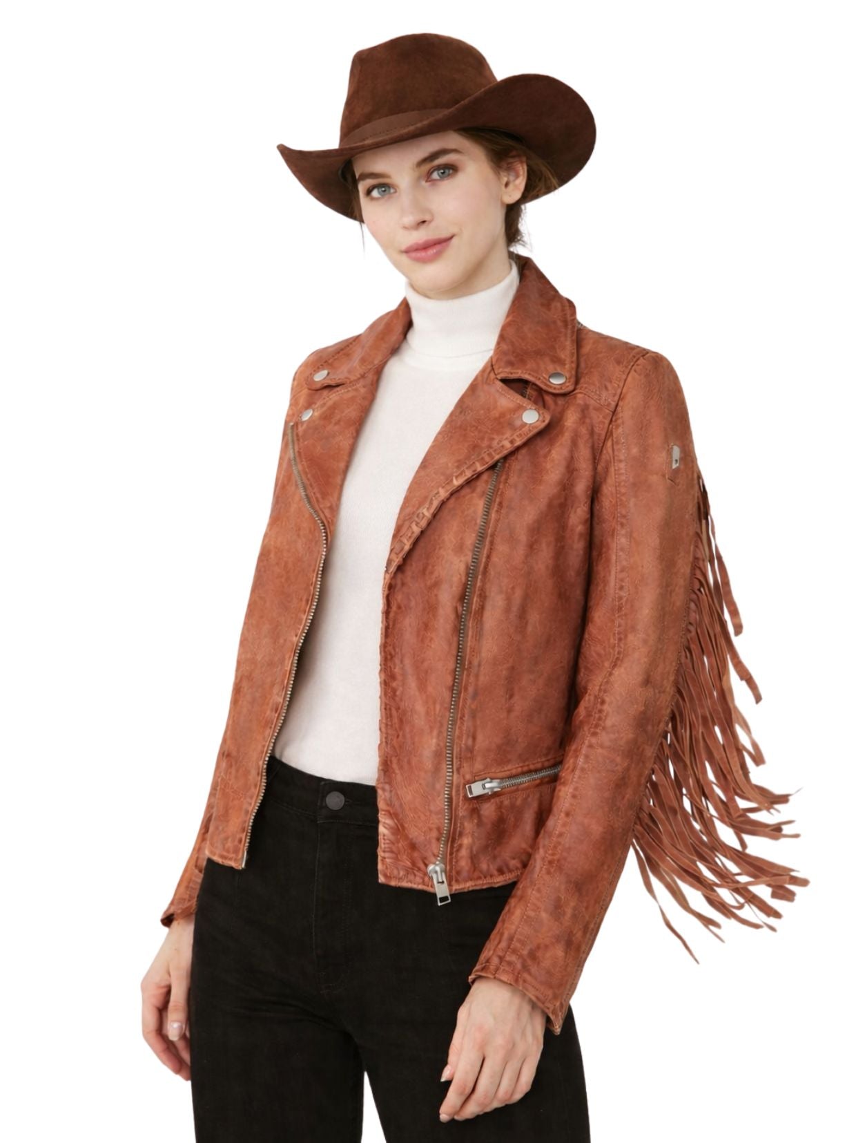 Woman wearing a brown suede jacket with fringe and a matching hat on a white background