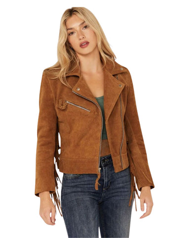 Woman wearing a brown suede jacket on a white background
