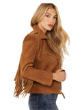 Woman wearing a brown suede jacket with fringes on a white background
