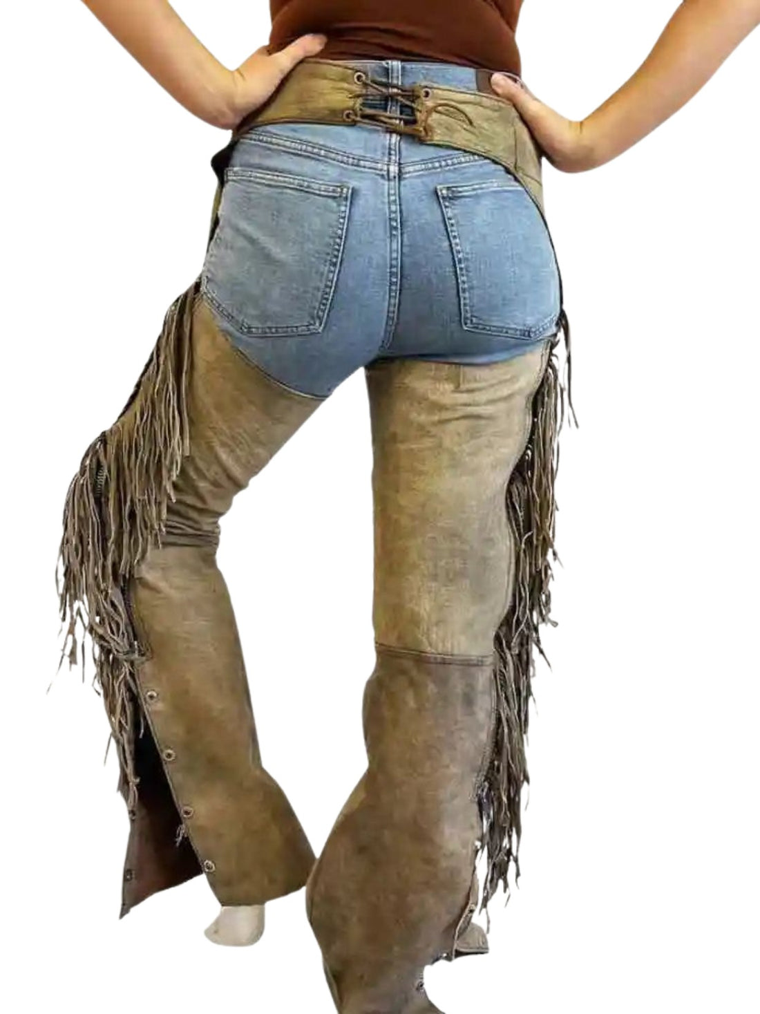 Brown fringed leather pants with blue denim shorts underneath on a white background