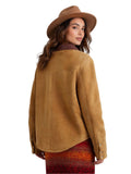 Woman wearing a brown suede jacket and hat on a white background