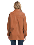 Brown leather jacket worn by a person on a white background