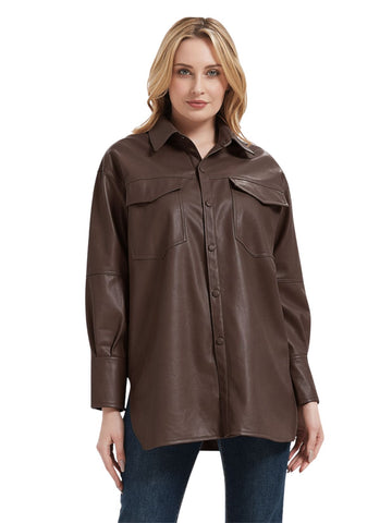 Woman wearing a brown leather jacket on a white background