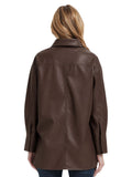 Brown leather jacket worn by a person on a white background