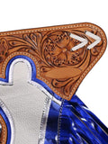 Close-up of a blue and white shoe with brown leather ornamentation on a white background