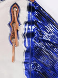 Blue and silver decorative item with a brown leather strap on a white background