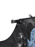 Close-up of a black leather harness with metal buckles on a white background