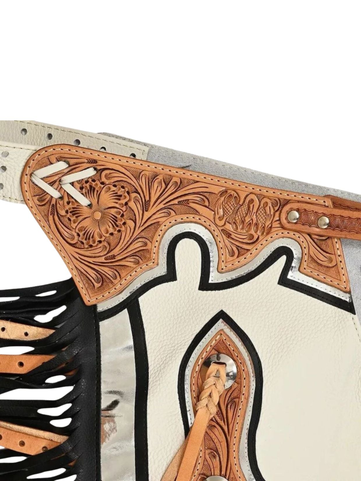 Close-up of a leather belt with intricate designs on a white background
