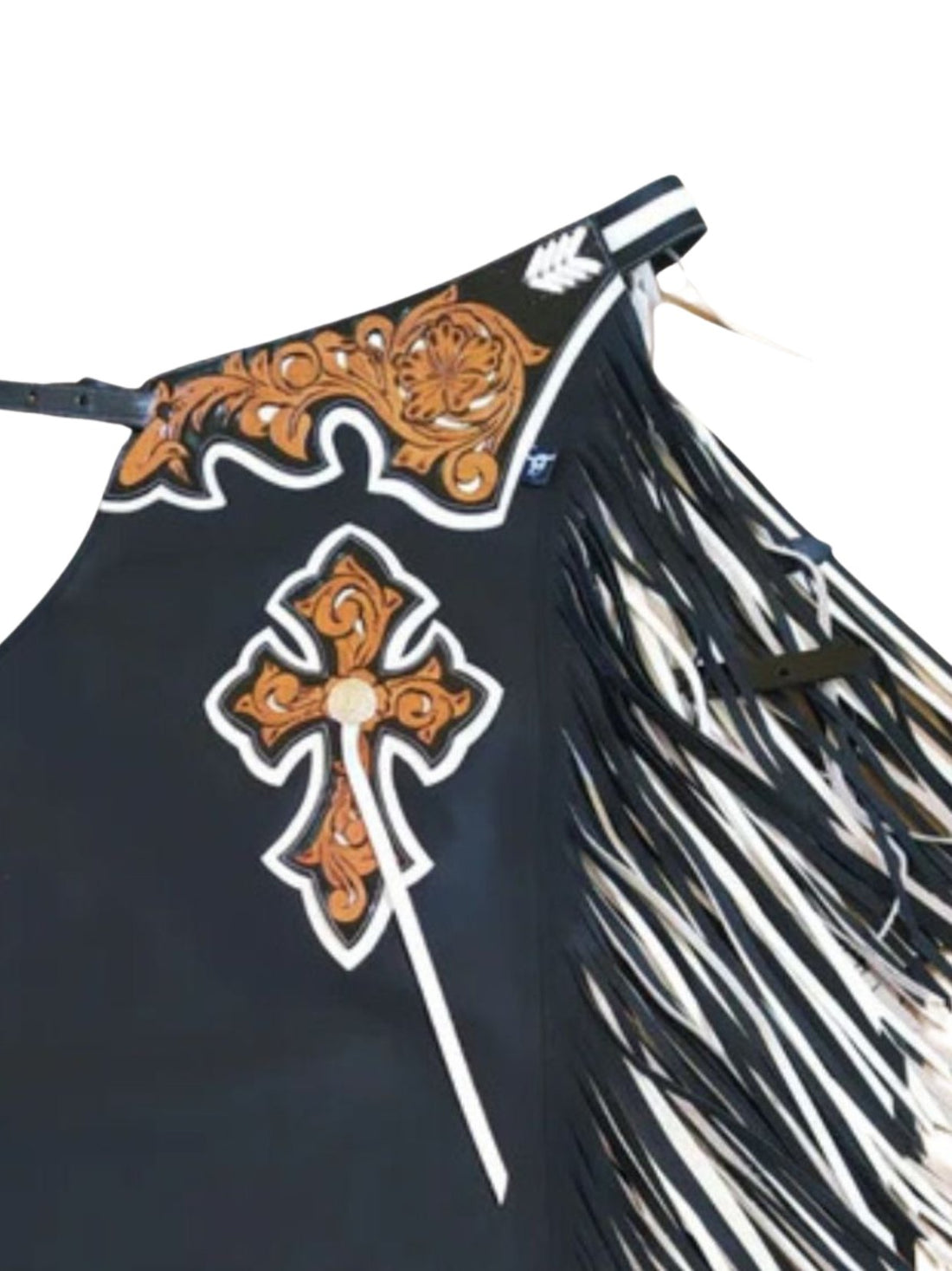 Black fringe rodeo chaps with decorative and patterns on a white background