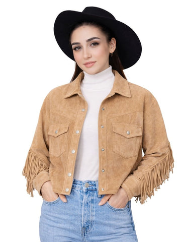 Woman wearing a tan suede jacket with fringe, white turtleneck, and blue jeans on a white background