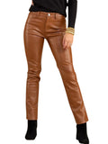 Brown leather pants worn by a person on a white background