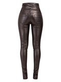 Brown leather pants on a white background