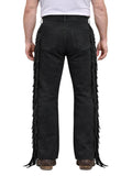 Black fringed pants worn by a person on a white background