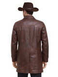 Man wearing a brown leather coat and cowboy hat on a white background