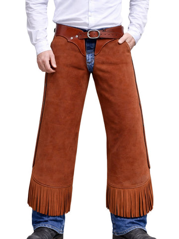 Brown suede chaps with fringes worn over jeans on a white background