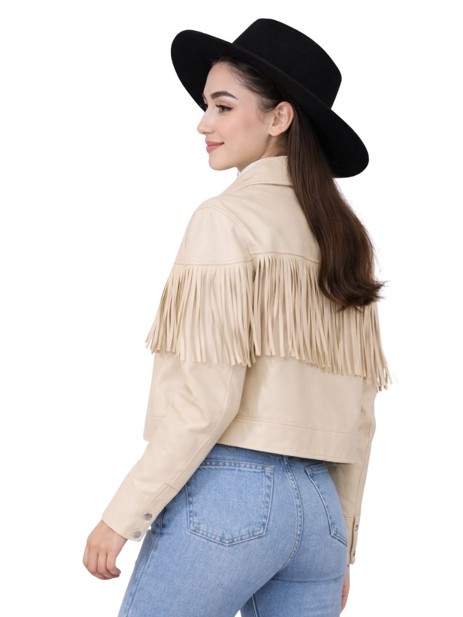 woman wearing beige fringe jacket and black hat side back view